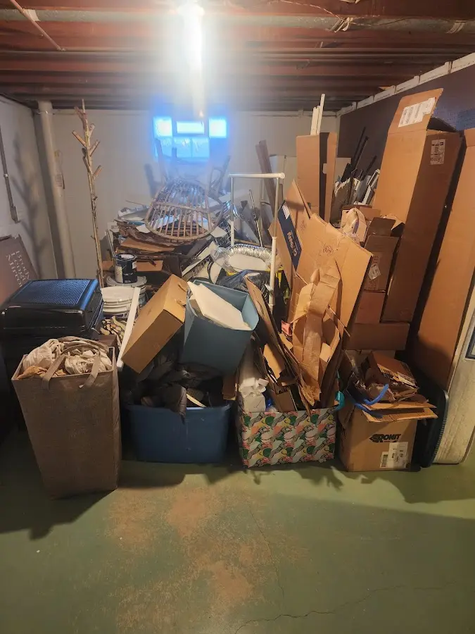 Roll-off dumpster container at job site for Construction Dumpster Rental in Burlington